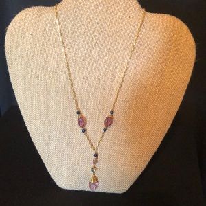 Gold and purple colored necklace  very pretty